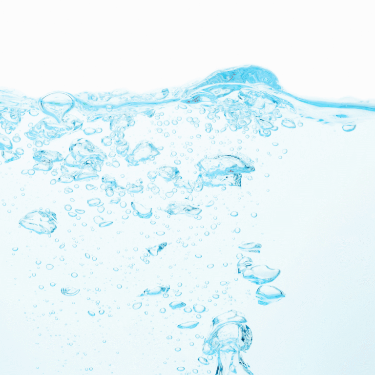 Fond bleu clair avec des bulles montantes symbolisant le mode Degas des nettoyeurs à ultrasons ASONIC.